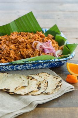  Cochinta Pibil: Una Sinfonia di Sapori speziati e Morbidezza Carnosa!